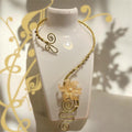 Whimsical Gold Orange Flower Necklace